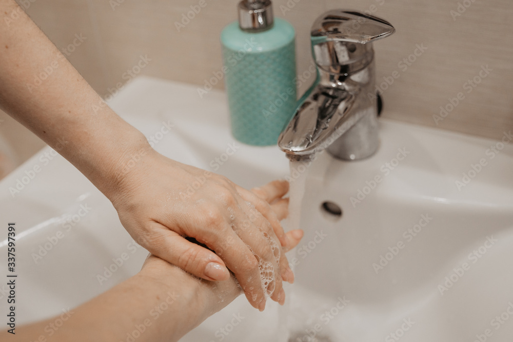 Corona virus travel prevention wash hands with soap and hot water. Hand hygiene for coronavirus outbreak. Protection by washing hands frequently concept panoramic banner header.
Corona virus travel prevention wash hands with soap and hot water. Hand hygiene for coronavirus outbreak. Protection by washing hands frequently concept panoramic banner header.