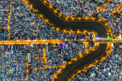 Top view aerial of Kieu bridge, Ho Chi Minh City with development buildings, transportation, energy power infrastructure. Hai Ba Trung and Phan Dinh Phung street photo