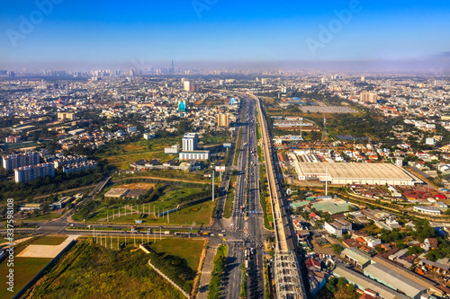 Top view aerial of Hanoi highway view from " Tram 2 " overpass, is intersection of 1A national road with Hanoi highway. Ho Chi Minh City, 