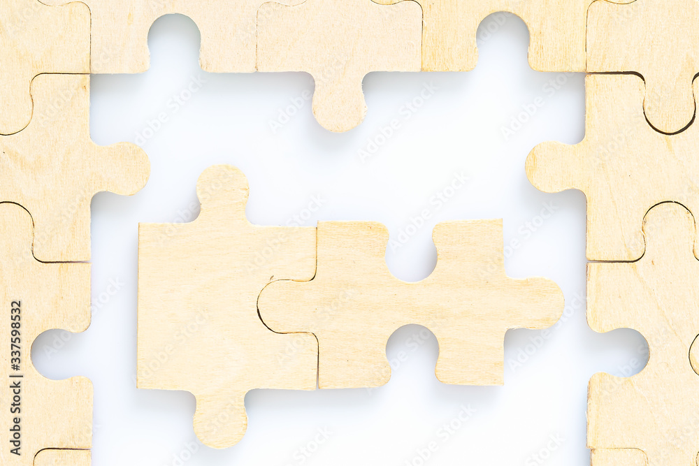 wooden jigsaw puzzle pieces on white background wooden jigsaw puzzle pieces on white background