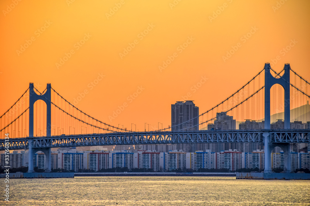 Naklejka premium Gwangan Bridge and Haeundae at Sunset, Busan City, South Korea.