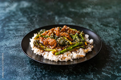 Delicious Asian Teriyaki Beef with Broccoli  Rice and Sesame Seeds.