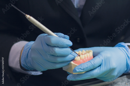 Dental technician or prosthesis worker. Prosthetic dentistry process