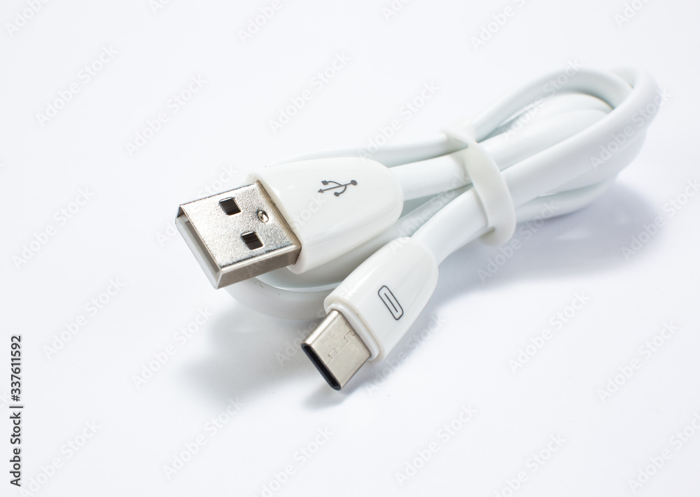 Guitar audio jack with black cable isolated on white background