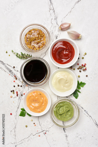 Fototapeta Naklejka Na Ścianę i Meble -  Bright set of different sauces for tasty and spicy food