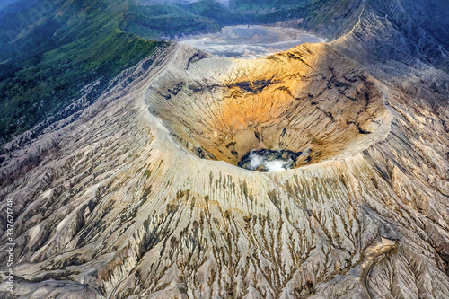 Aerial view of Mount Bromo, is an active volcano and part of the Tengger massif, in East Java, Indonesia. Famous travel destination backpacker in south east asia photo