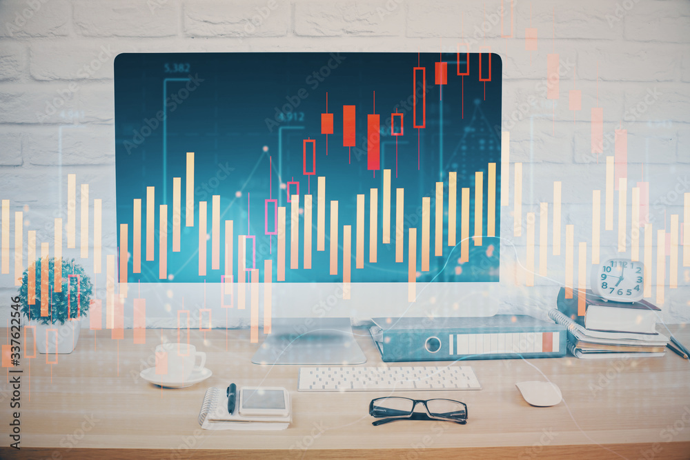 Forex graph hologram on table with computer background. Double exposure. Concept of financial markets. Forex graph hologram on table with computer background. Double exposure. Concept of financial markets.