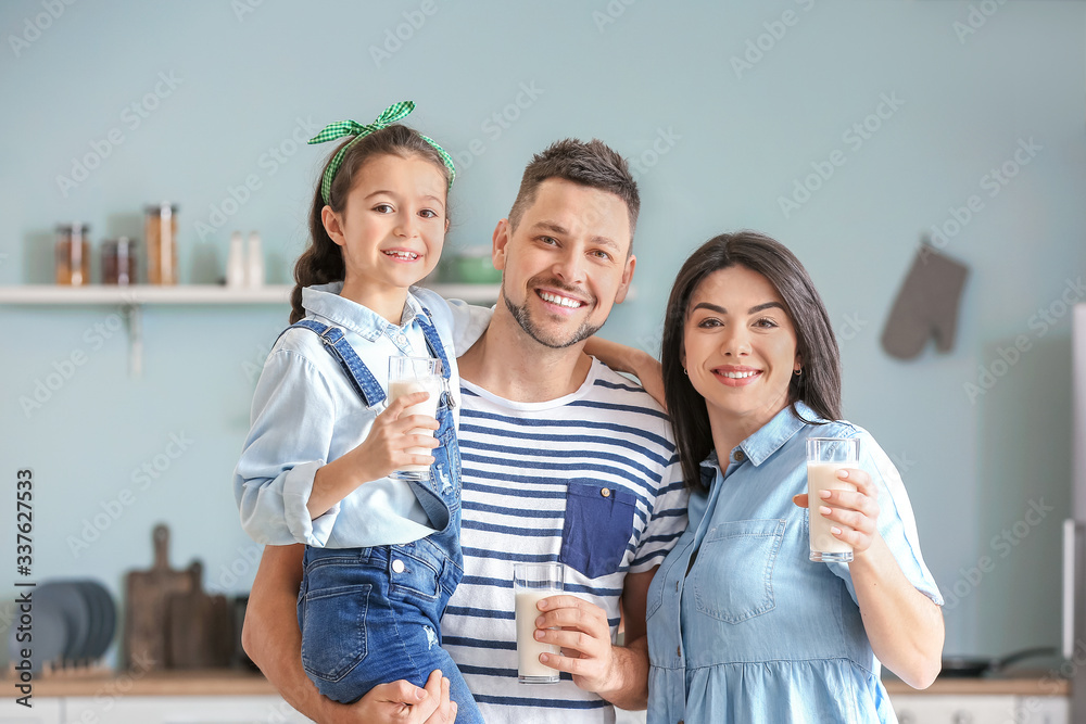 Family drinking milk at home