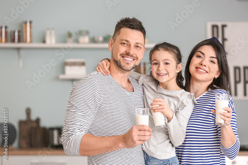Family drinking milk at home