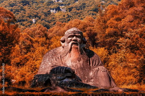 Laozi statue on Qingyuan Mountain, Quanzhou, China. 1,000-year-old Taoist stone carvings.