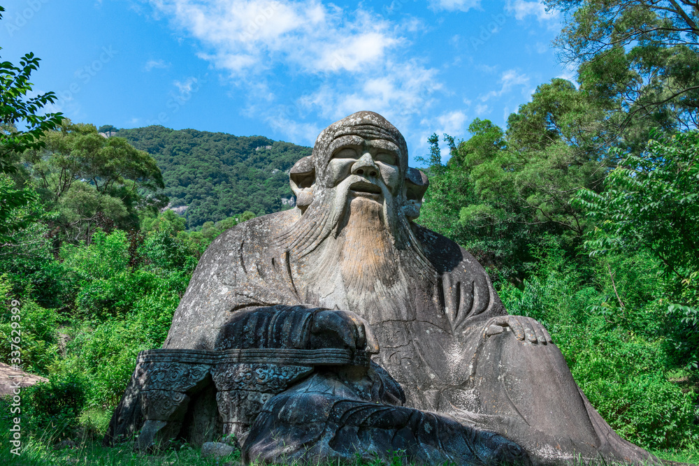 Laozi statue on Qingyuan Mountain, Quanzhou, China. 1,000-year-old Taoist stone carvings. Laozi statue on Qingyuan Mountain, Quanzhou, China. 1,000-year-old Taoist stone carvings.