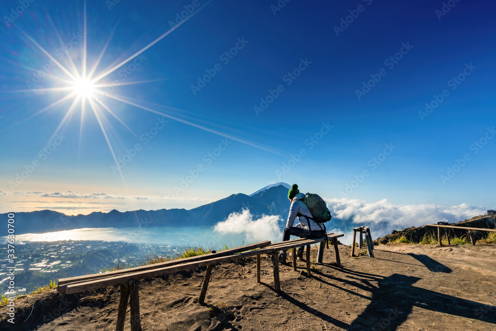 Aerial view of travel people with backpack on volcano Batur in the tropical island Bali. Royalty high quality free stock image of Danau Batur, Indonesia.