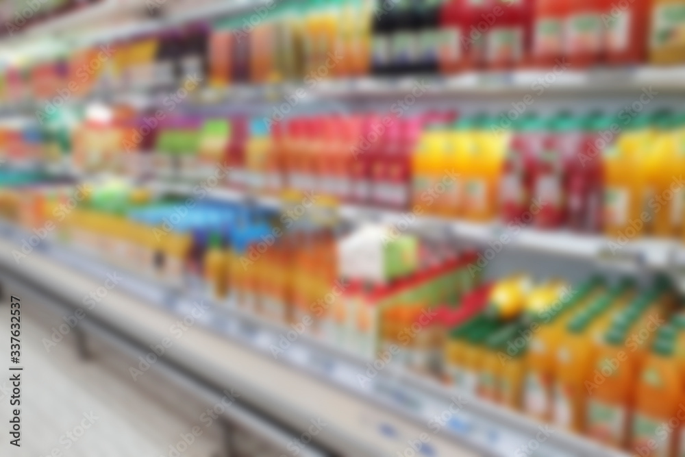 Blurred of shelf of product inside supermarket or blurry of department store or blur of shopping mall interior use for your background, pattern, design or your concept.