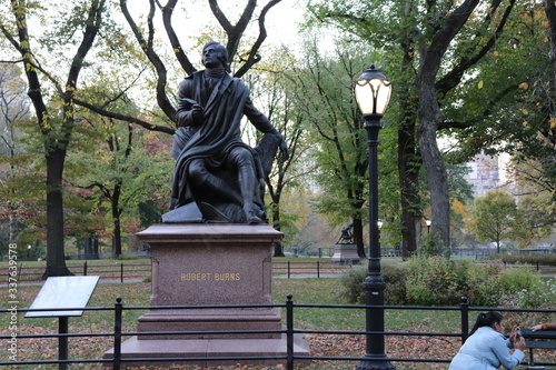 New York in her beautiful autumn suit Central Park
