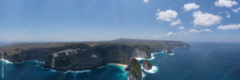 Fototapeta premium Aerial view of Manta Bay or Kelingking beach on Nusa Penida Island, Bali, Indonesia.