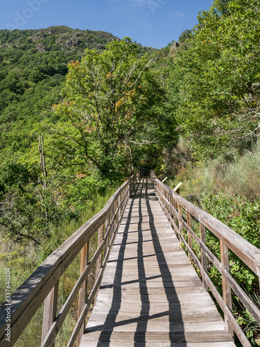 Wooden walkway on the River Mao Canyon hiking trail, Ourense, Galicia, Spain