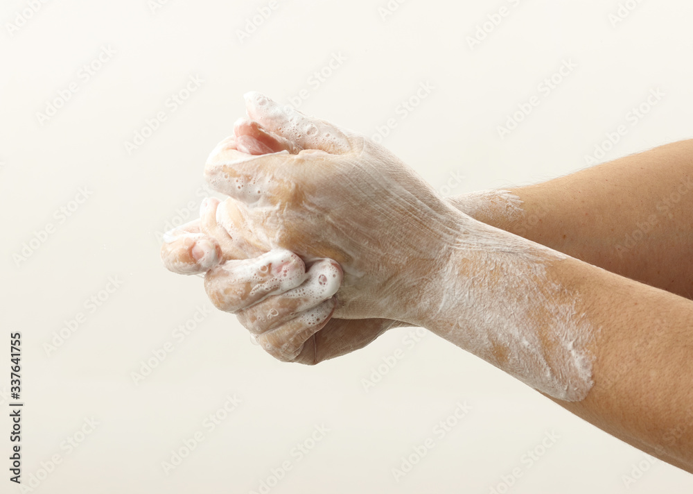 Fototapeta premium hands with soap foam