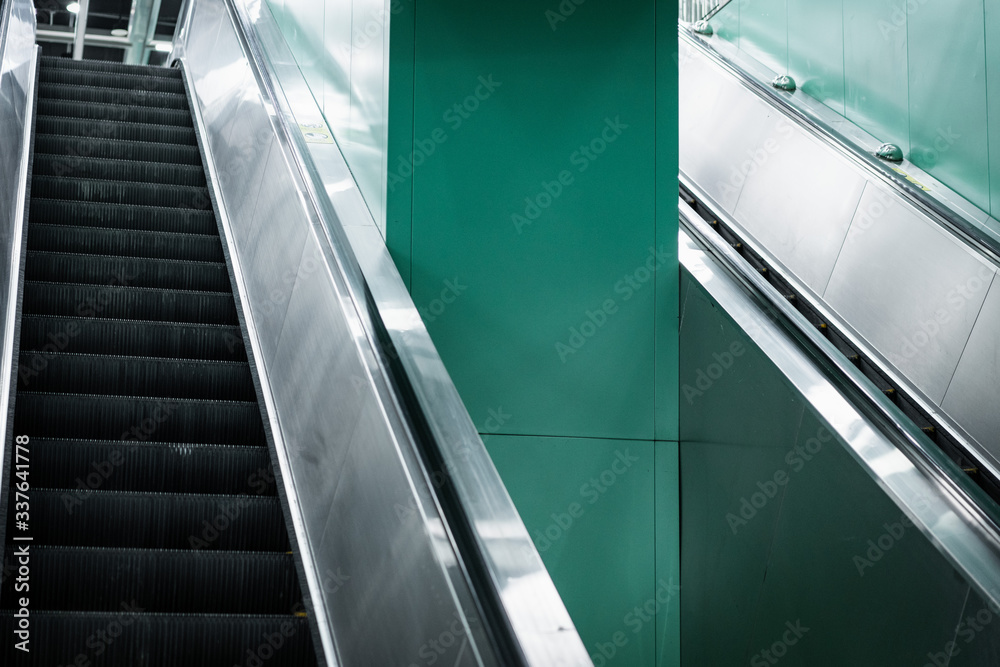 Fototapeta premium Escalators in the subway station