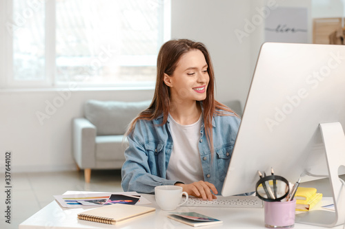 Young designer working on c...