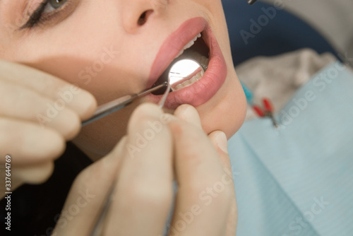 The girl at the dentist's appointment. Dental treatment. Dentistry. Dental treatment