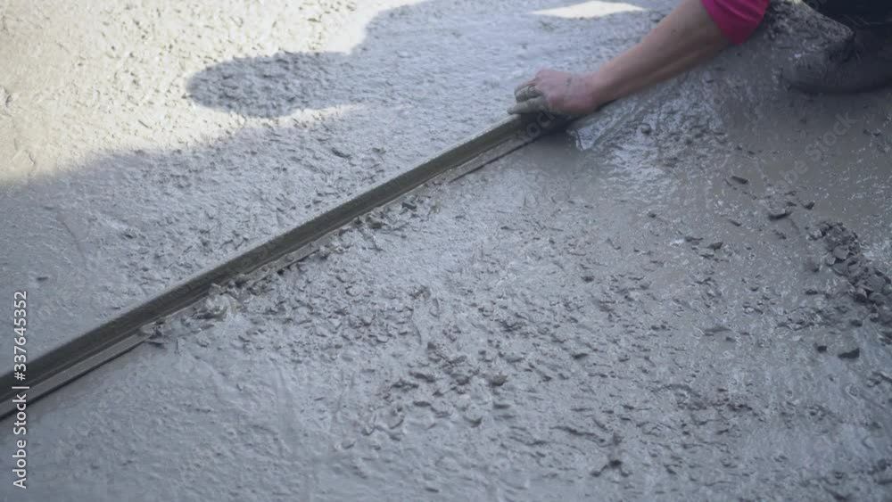 industrial worker Plastering concrete to build floor worker with plastering tools .professional of skilled labor construction industry.selective focus.
industrial worker Plastering concrete to build floor worker with plastering tools .professional of skilled labor construction industry.selective focus.