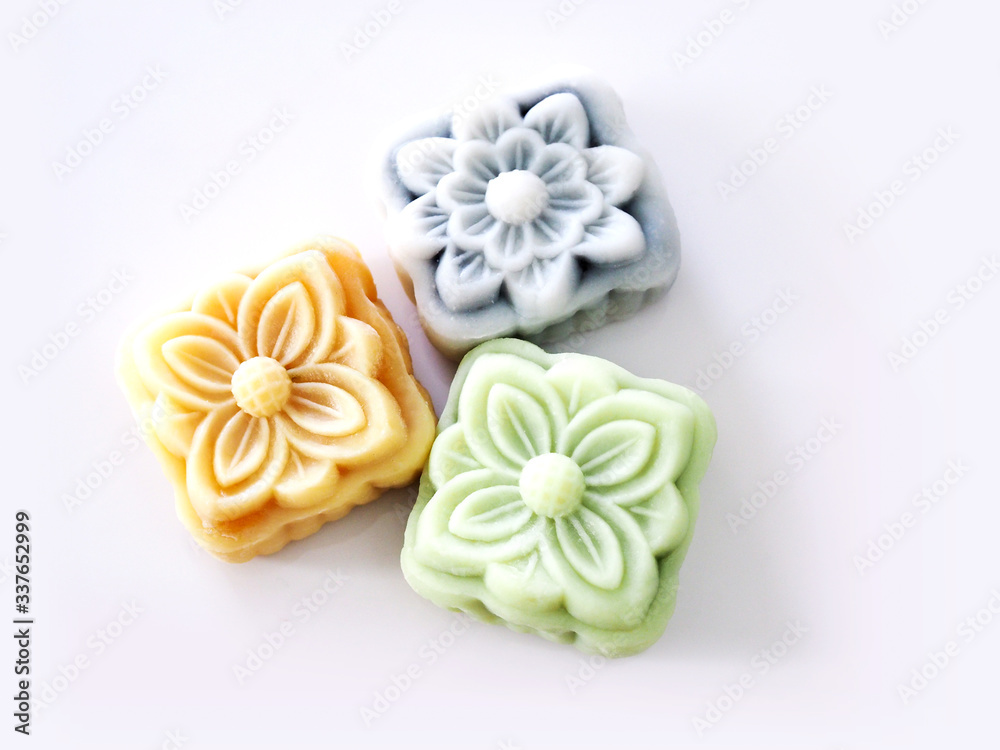 Top view of colorful snow lotus dessert, mooncake bua hema isolated on white background. Top view of colorful snow lotus dessert, mooncake bua hema isolated on white background.