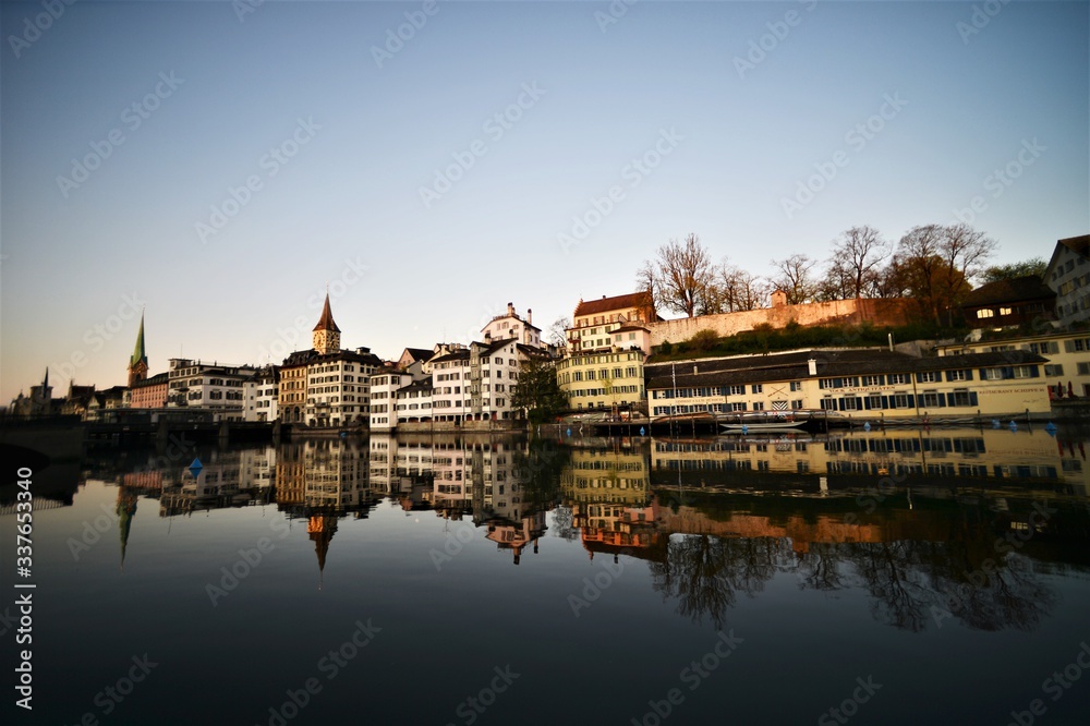 Limmat with old houses facade and Lindenhof in the morning in the city of Zurich Switzerland