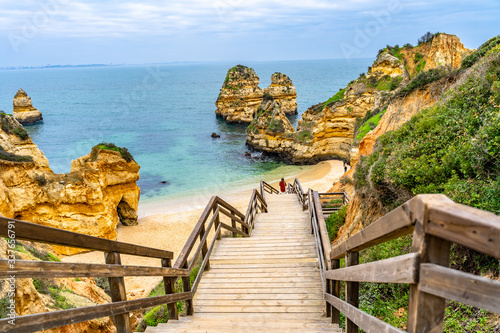 Camilo Beach in Lagos, Portugal, with its rock cliffs and blue ocean. Algarve, Portugal.