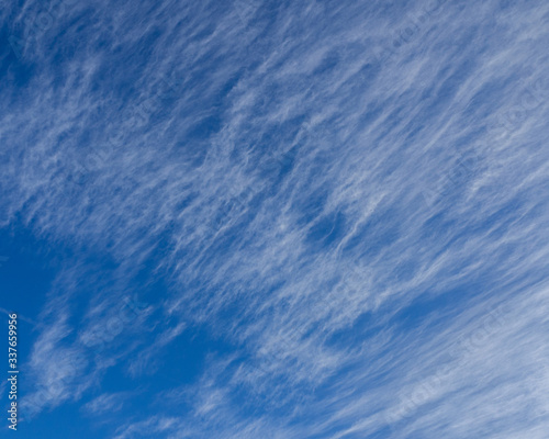 Blue sky and white cirrus clouds