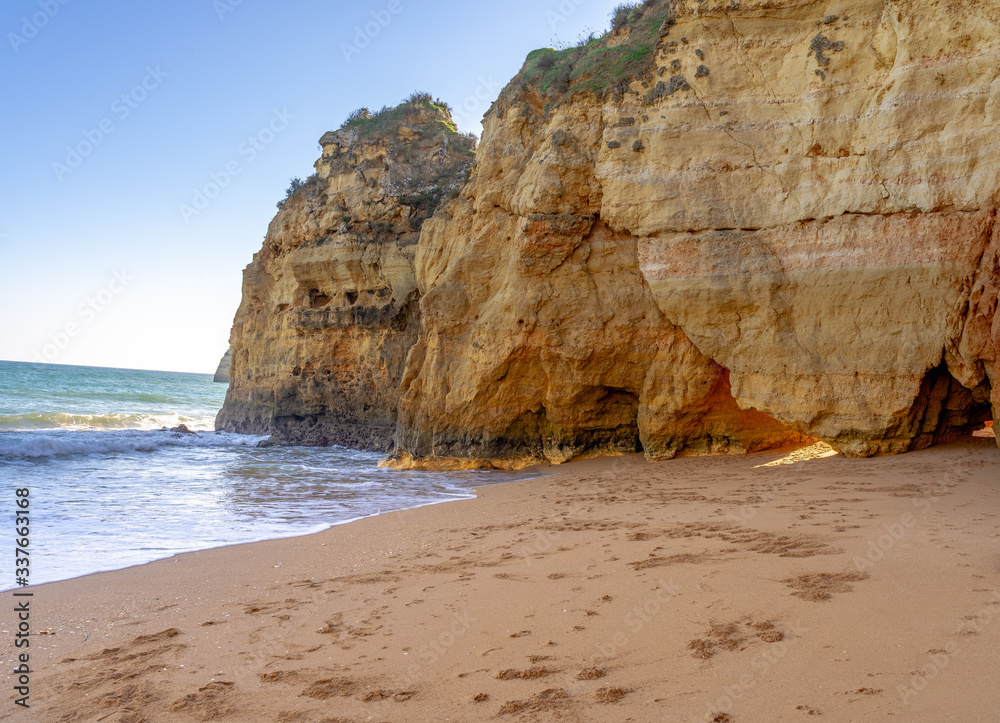 Rocks on the shore of Atlantic ocean in Algarve region in south Portugal. 