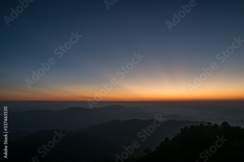 Twilight, sunrise and sea of fog in the morning on the mountains of northern Thailand, during the rainy season. © Anon