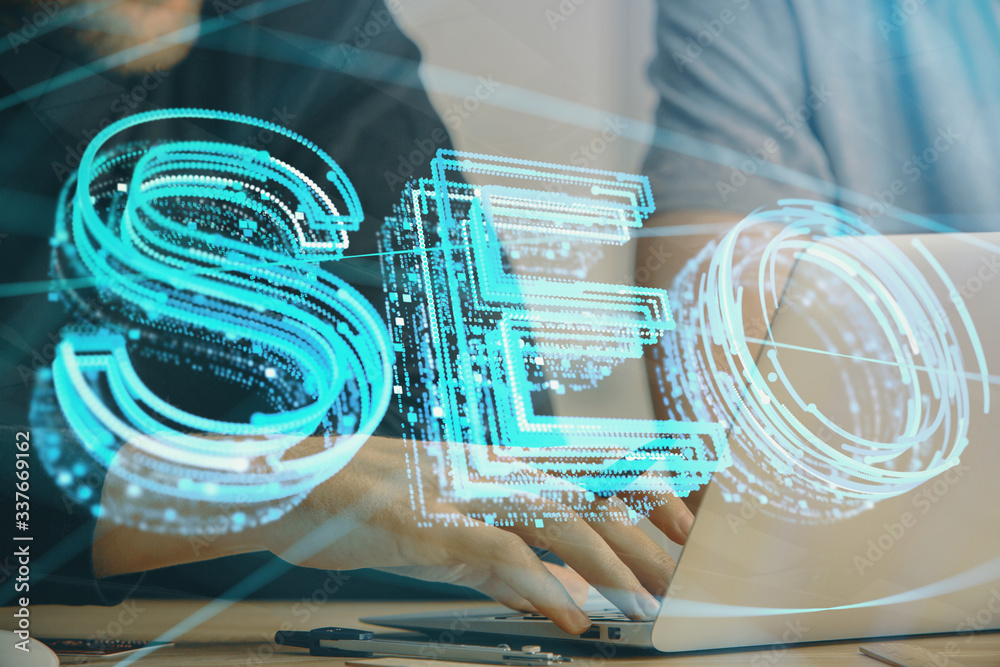 Multi exposure of seo icon with man working on computer on background. Concept of search engine optimization.