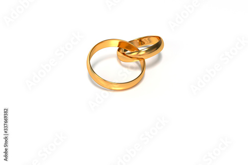 Two golden rings on a white background. Wedding. 