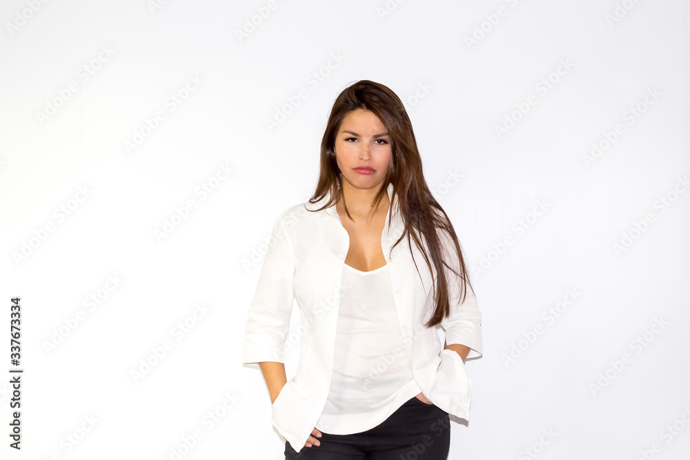 Angry latina beautiful woman on white isolated background Angry latina beautiful woman on white isolated background