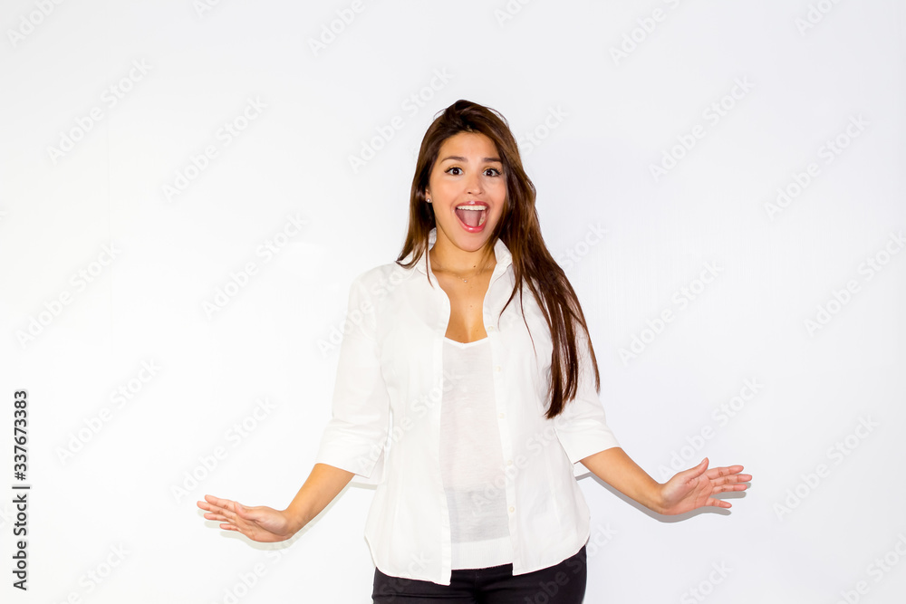 Surprised hispanic woman on white background Surprised hispanic woman on white background