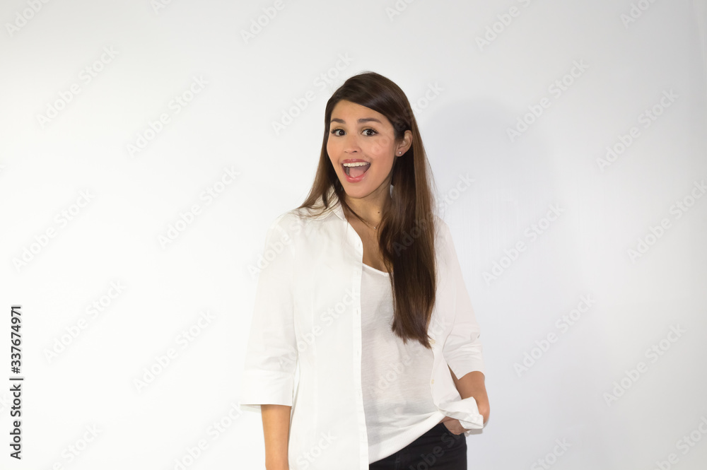 Surprised hispanic woman on white background Surprised hispanic woman on white background