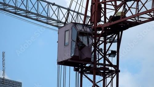 Slowly turning cab of an old tower crane