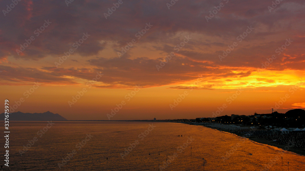 Obraz premium Fiery sunset over the beach of Terracina in Italy.