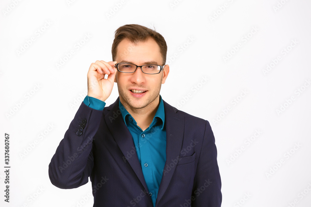 A view of a shocked young businessman isolated on white background A view of a shocked young businessman isolated on white background
