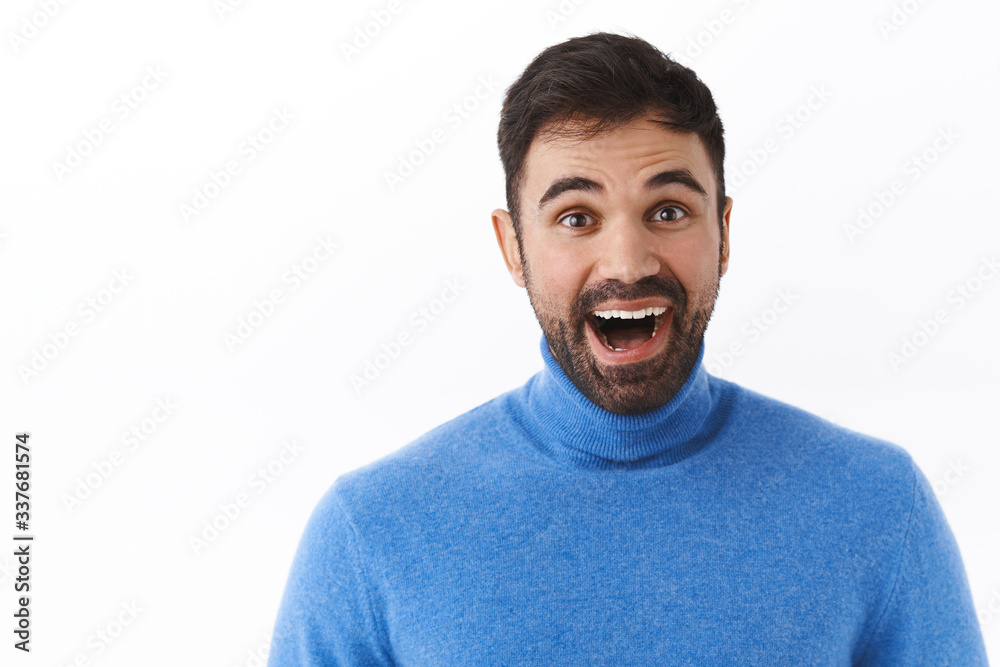 Close-up portrait of enthusiastic, happy smiling caucasian man with beard, look dreamy and amazed at camera, contemplating something beatiful and amazing, standing white background Close-up portrait of enthusiastic, happy smiling caucasian man with beard, look dreamy and amazed at camera, contemplating something beatiful and amazing, standing white background