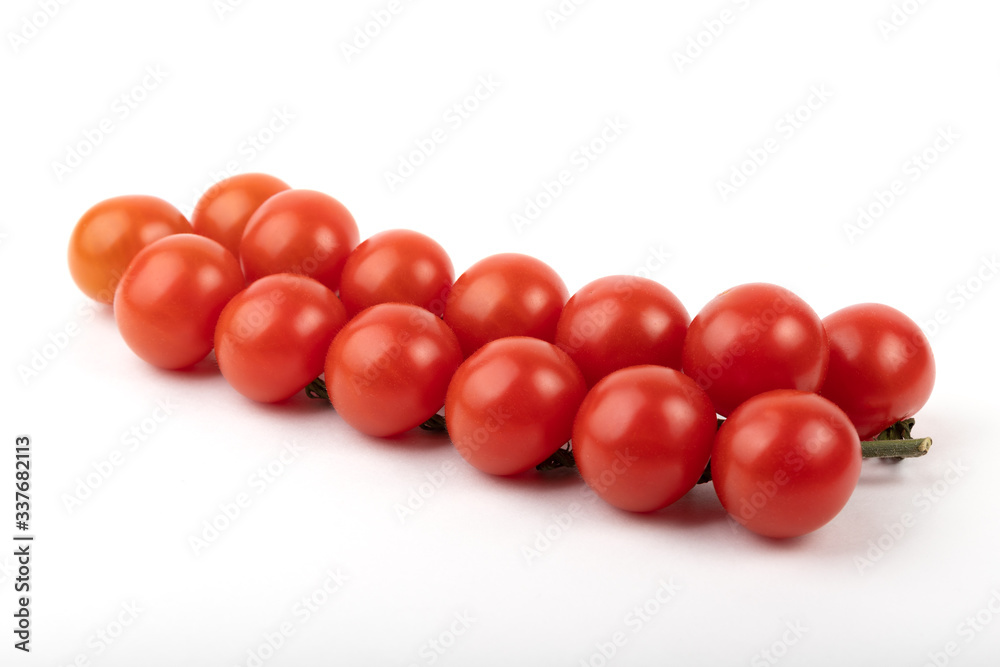 Red tomatoes on a white background Red tomatoes on a white background