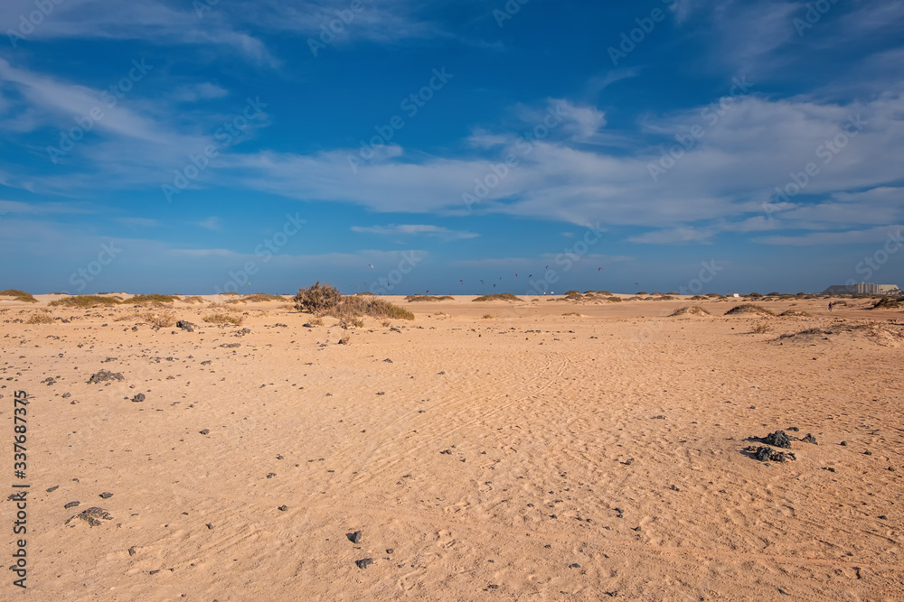 High angle view of road going through Corralejo dunes nature park in Fuerteventura. Aerial drone shot in october 2019 High angle view of road going through Corralejo dunes nature park in Fuerteventura. Aerial drone shot in october 2019