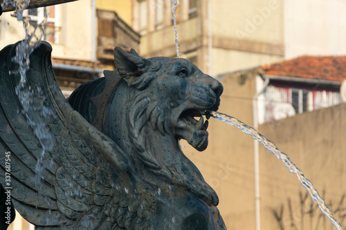 Fonte dos Leões (Lions' fountain). Lion statue with wings expelling water from the mouth.