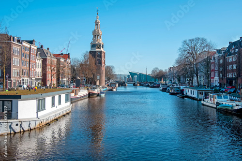 City scenic from Amsterdam in the Netherlands with the Montelbaan tower