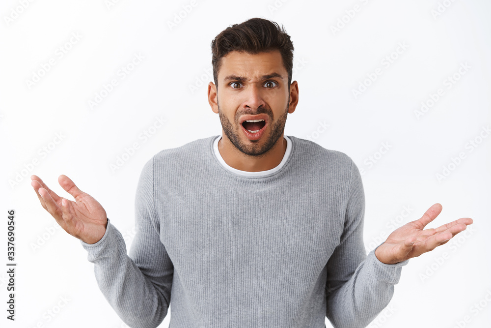Clueless disappointed angry male client shocked with bad service, spread hands sideways in dismay and distressed, arguing looking questioned and frustrated, complain or condone someone Clueless disappointed angry male client shocked with bad service, spread hands sideways in dismay and distressed, arguing looking questioned and frustrated, complain or condone someone