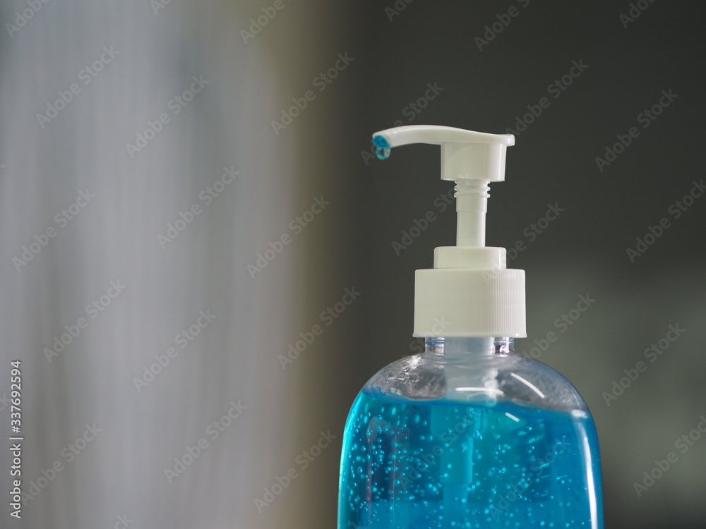 Hand Sanitizer, gel alcoholic mixture with gelatin in clear Plastic bottle with pump pushing wash clean dirty to prevent germs protect Contagious disease corona virus, covid-19 Hand Sanitizer, gel alcoholic mixture with gelatin in clear Plastic bottle with pump pushing wash clean dirty to prevent germs protect Contagious disease corona virus, covid-19