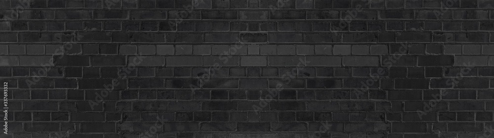 Dark black anthracite damaged rustic brick wall texture banner panorama