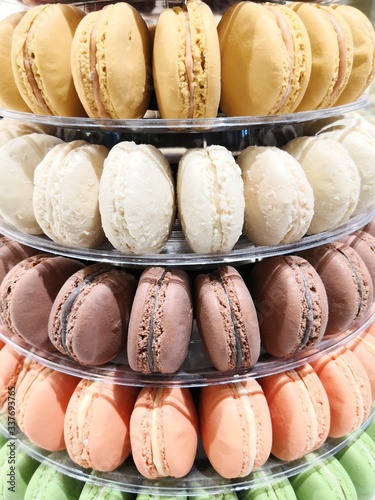 French Macaroons vertical iimage on display at store photo