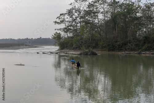 Fisherman at Rapti river of Chitwan national park in Nepal