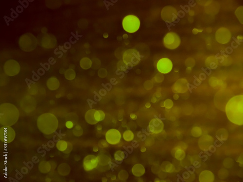 Bokeh lights effect isolated on black background. golden bokeh confetti and spark overlay texture.